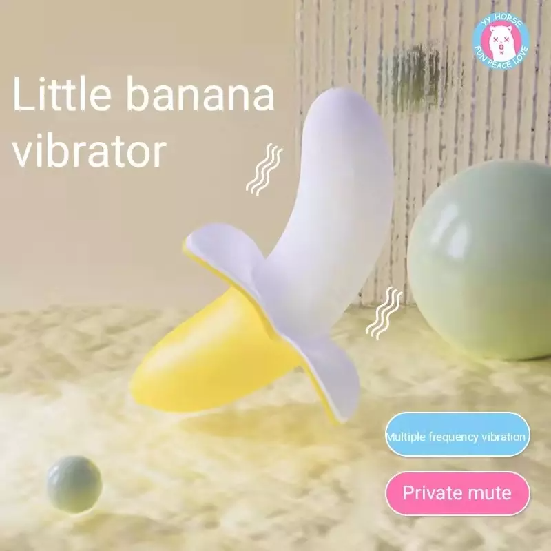Yellow and white 'Little banana' vibrator on a textured surface with text indicating features.