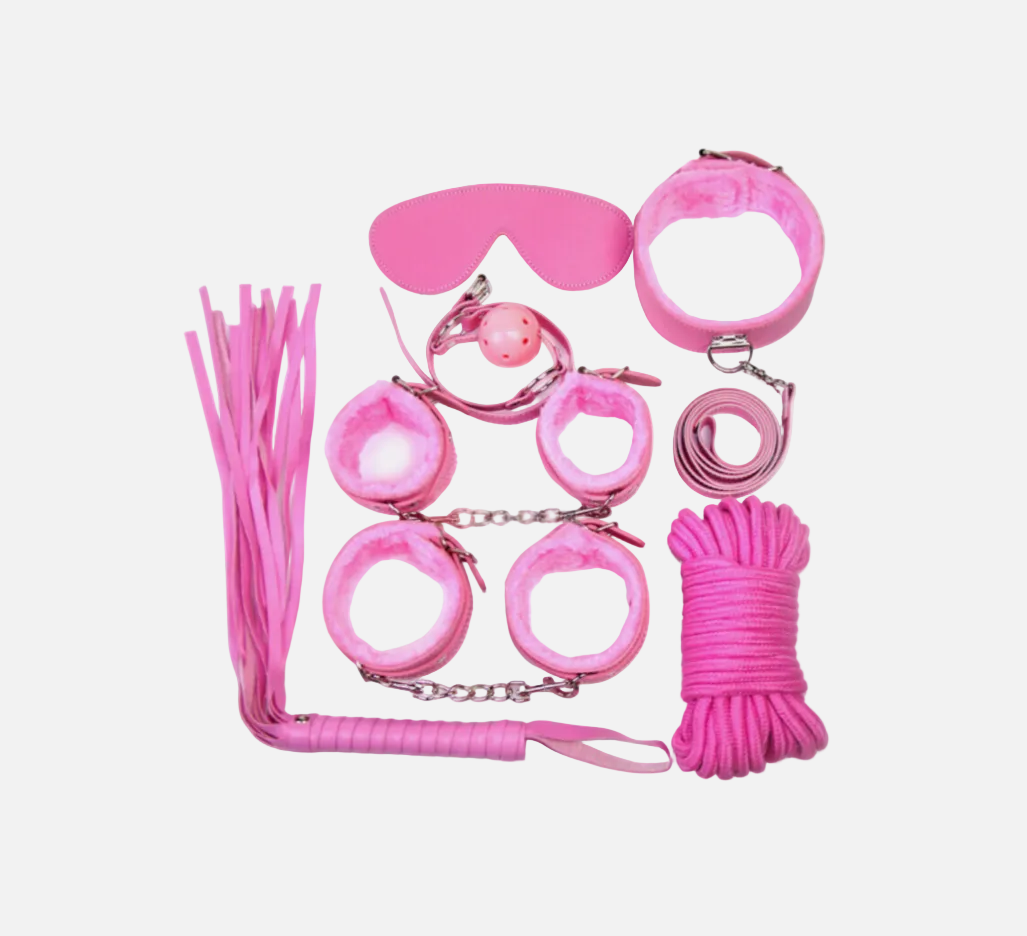Pink restraining device set on a white background