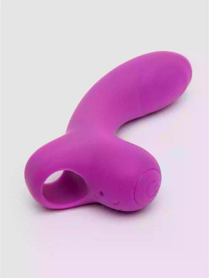 Purple silicone butt plug on a white background