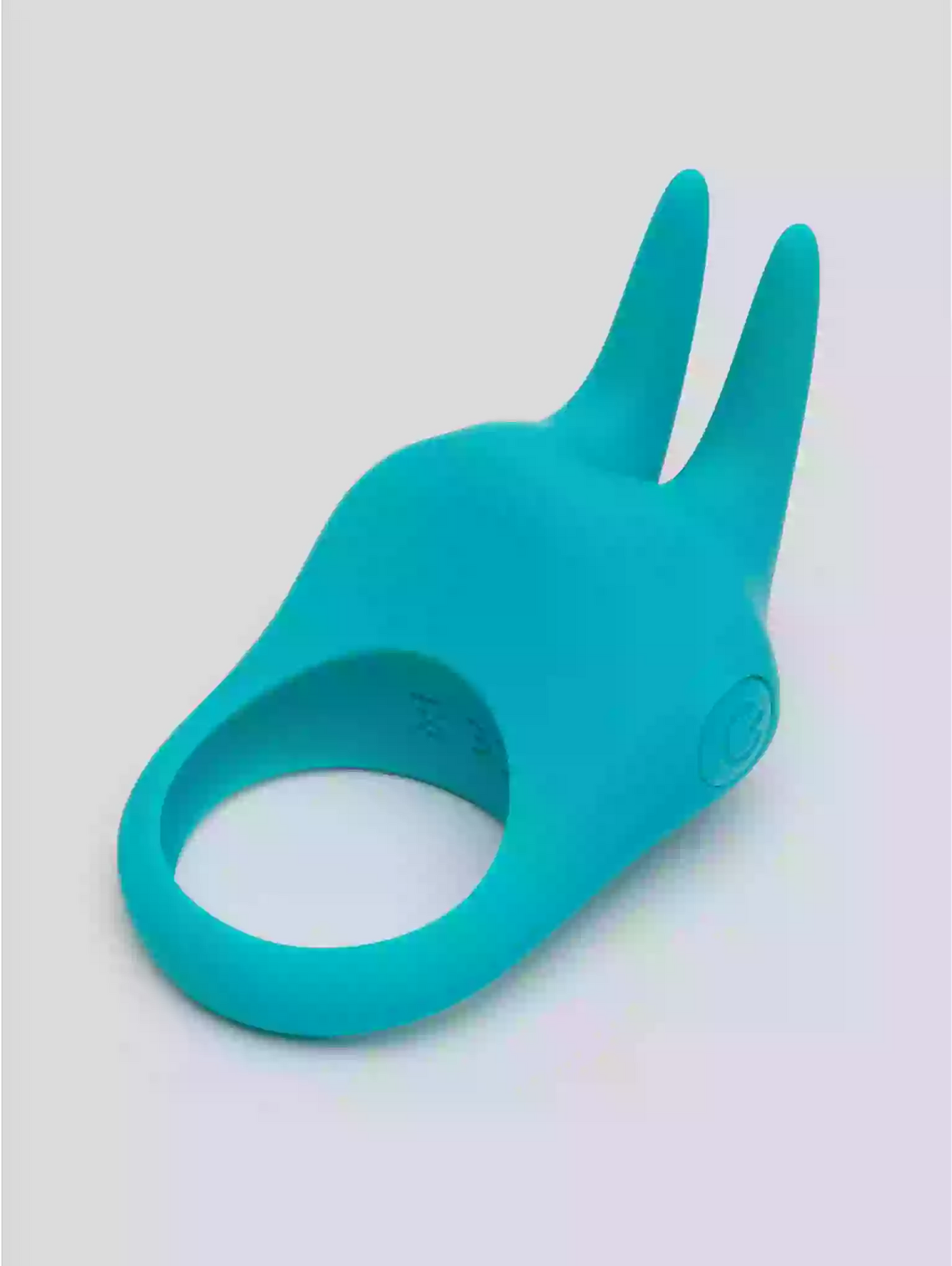 Turquoise silicone ring on a light gray background