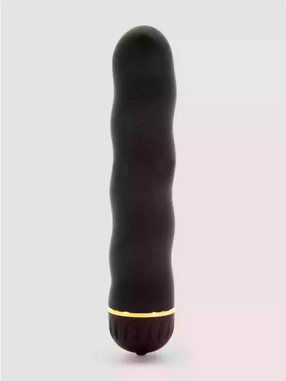 Black and gold electronic device on a light gray background