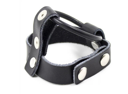 Black leather strap with silver studs on a white background