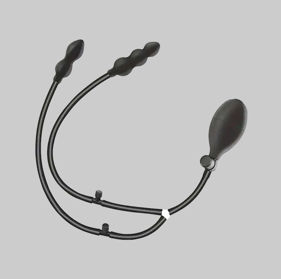 Black medical device with multiple probes on a gray background
