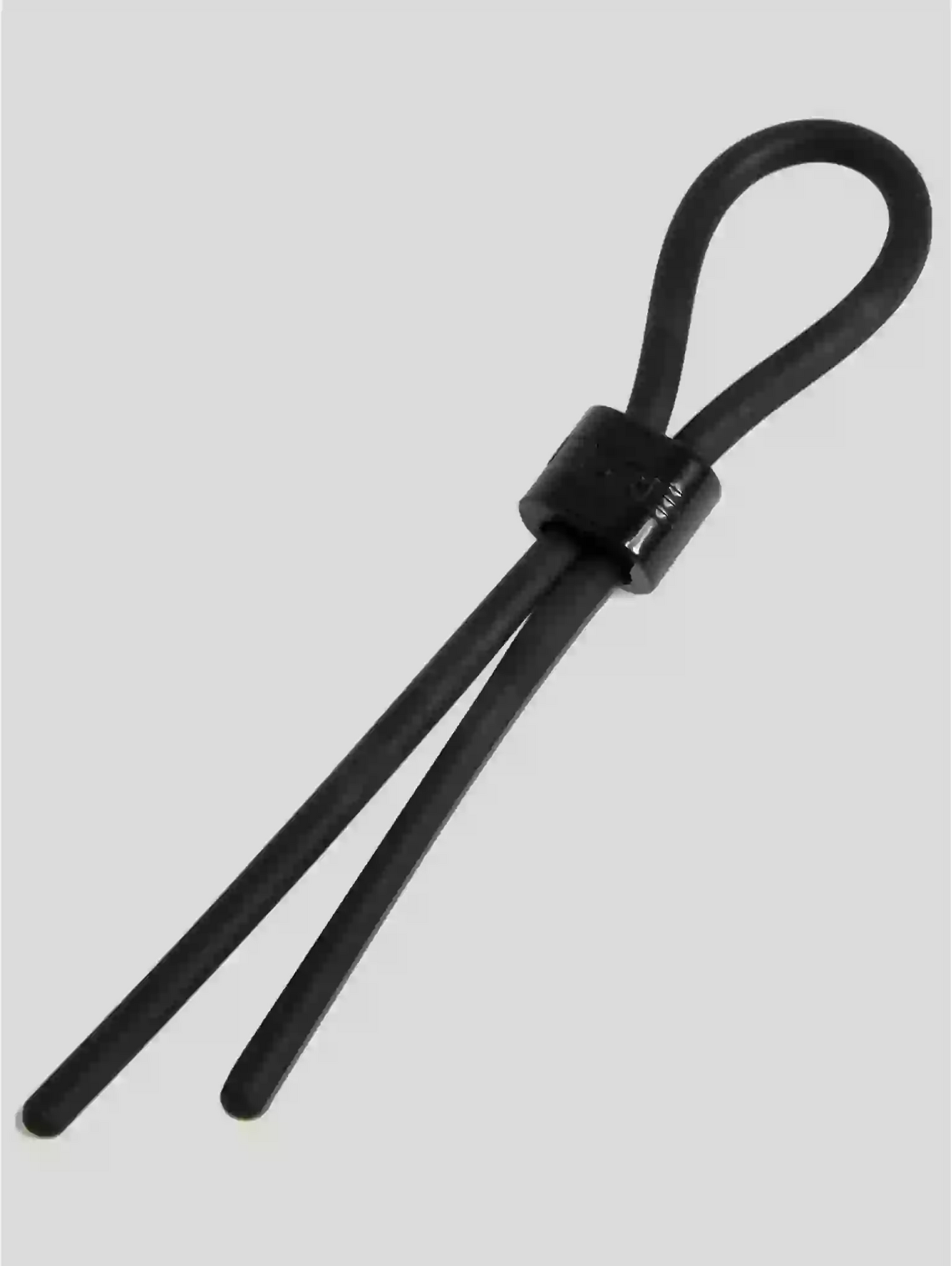 Black shoelace on a light gray background