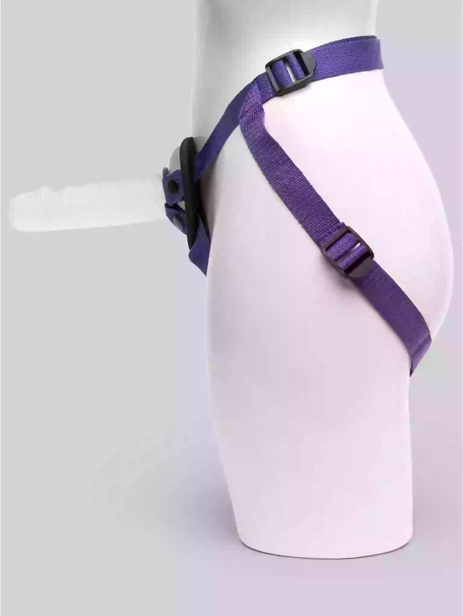 Purple harness on a mannequin against a white background