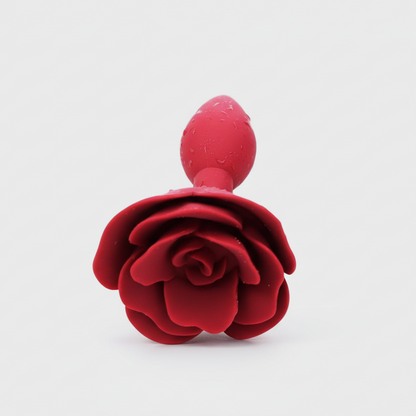 Red rose-shaped object on a white background
