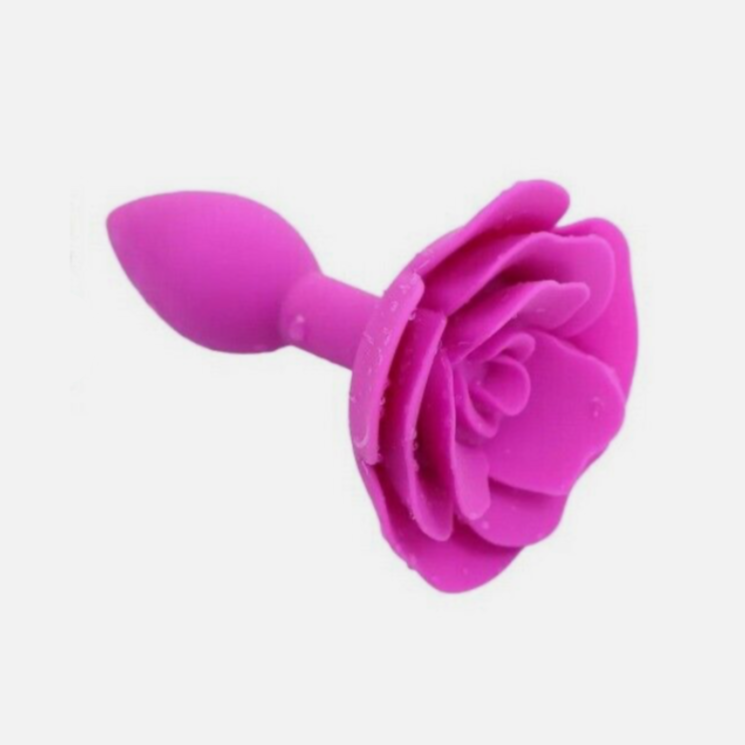 Pink rose-shaped object on a white background
