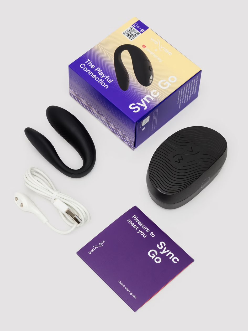 Sync Go product with packaging, remote control, and USB cable on a white background