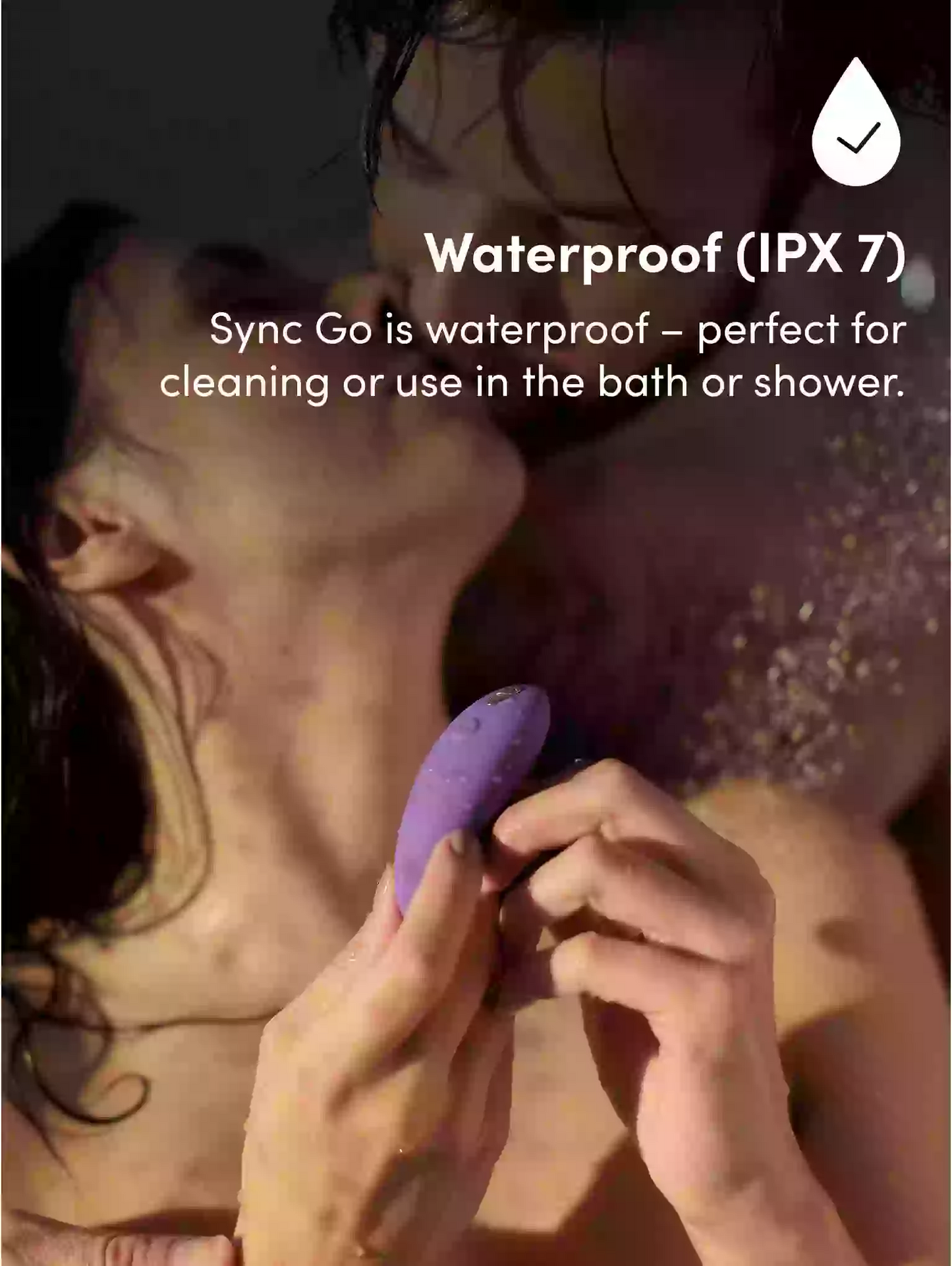 Person holding a purple device with text about its waterproof feature.