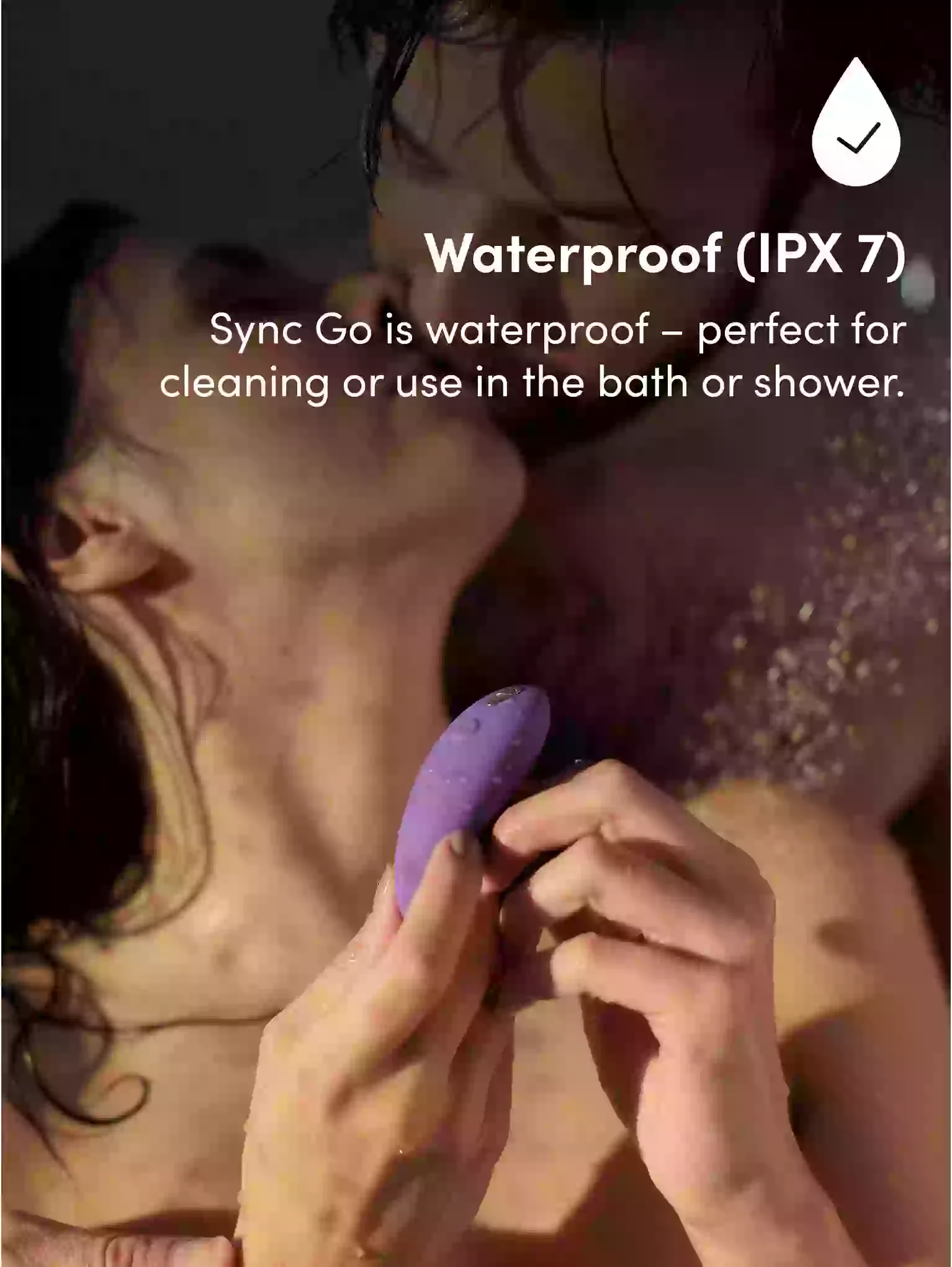 Person holding a purple device with text about its waterproof feature.