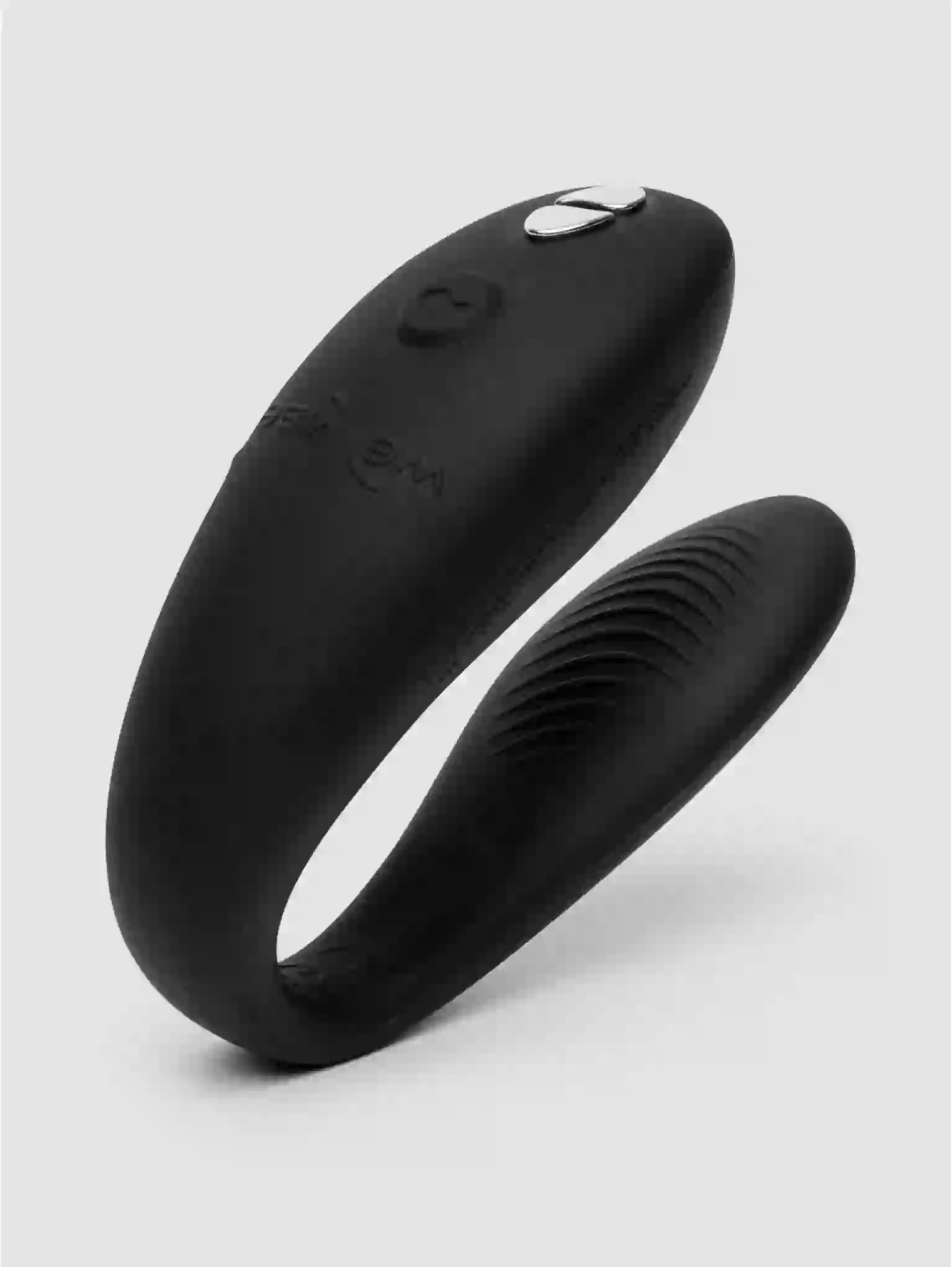 Black silicone ring on a light gray background