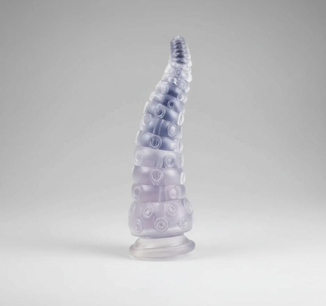 Tall, textured glass sculpture on a gray background