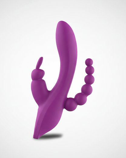 Purple silicone tool with a smooth handle and textured beads on a white background