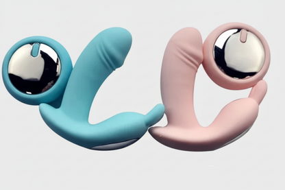 Two silicone toys, one blue and one pink, on a light gray background.