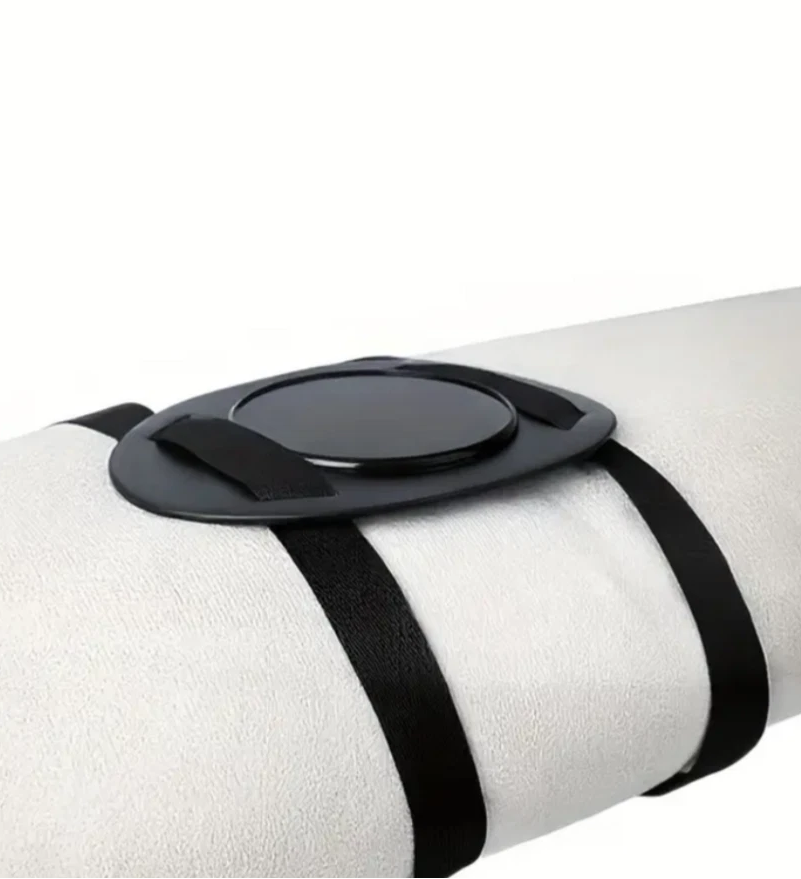 White cylindrical object with black straps and a circular black component on a white background