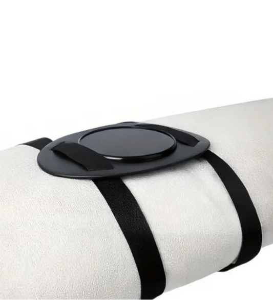 White cylindrical object with black straps and a circular black component on a white background