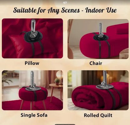 Red blanket with black straps used as a pillow, on a chair, over a single sofa, and rolled up on a bed.