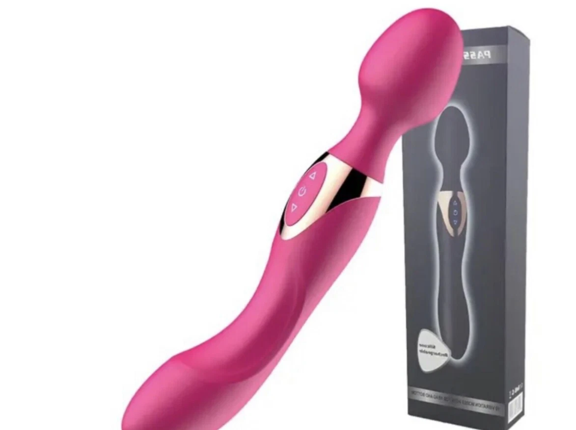 Pink electronic device with packaging on a white background