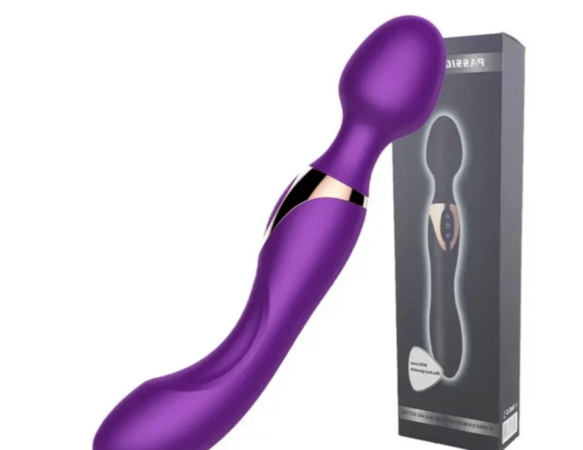 Purple electronic device with packaging on a white background