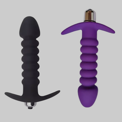 Black and purple silicone shafts on a white background