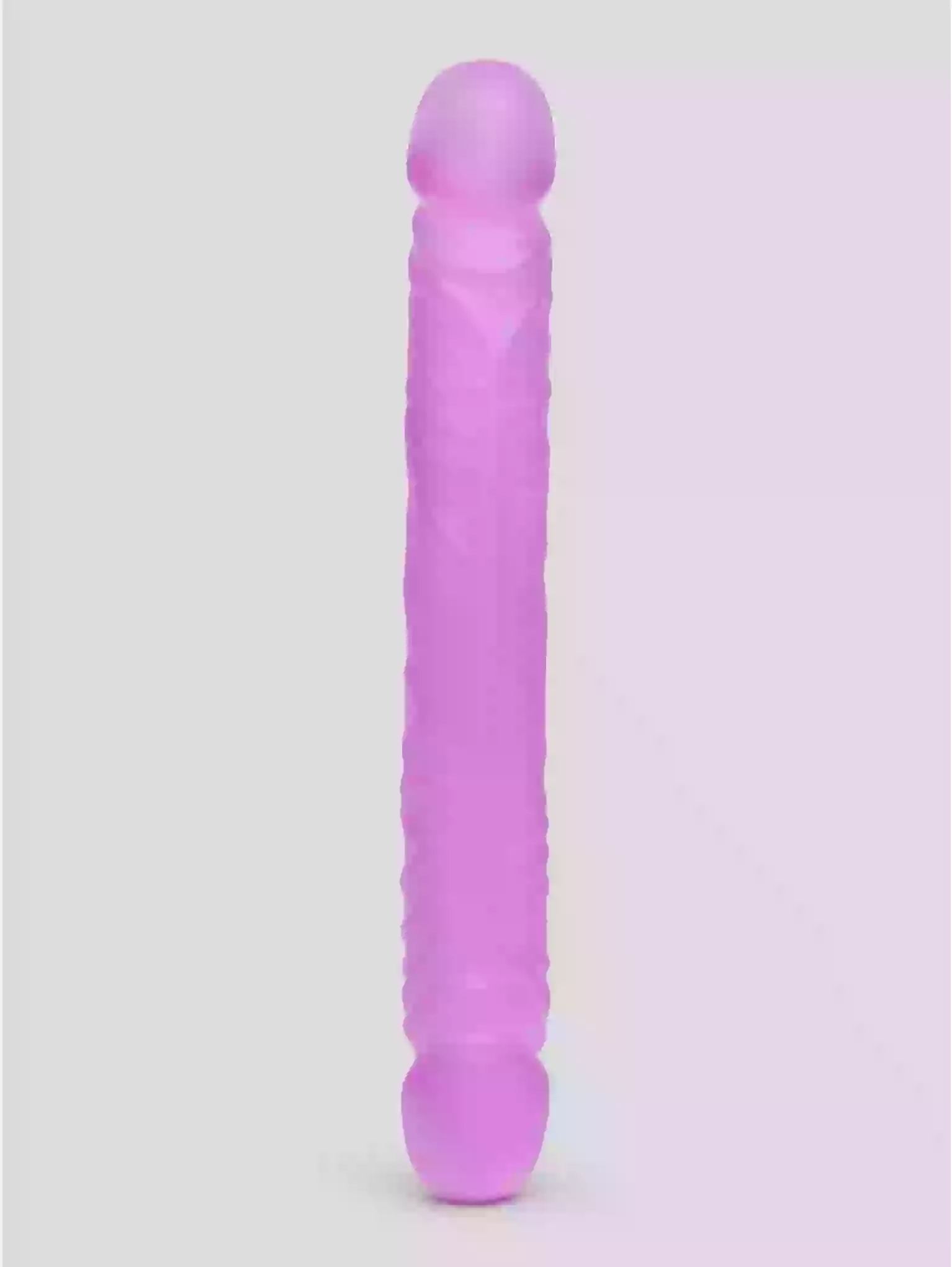 Purple and white cylindrical object on a light gray background