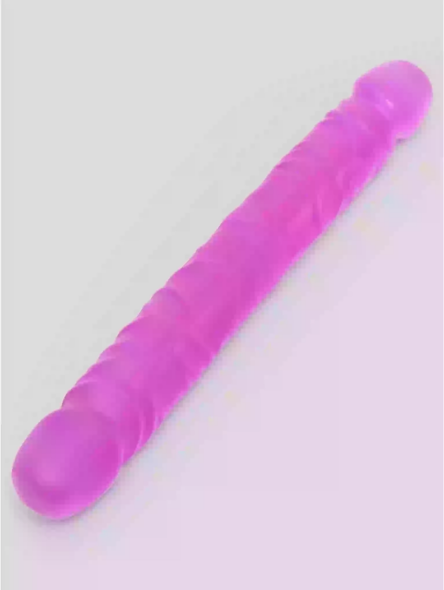 Purple cylindrical object on a light gray background
