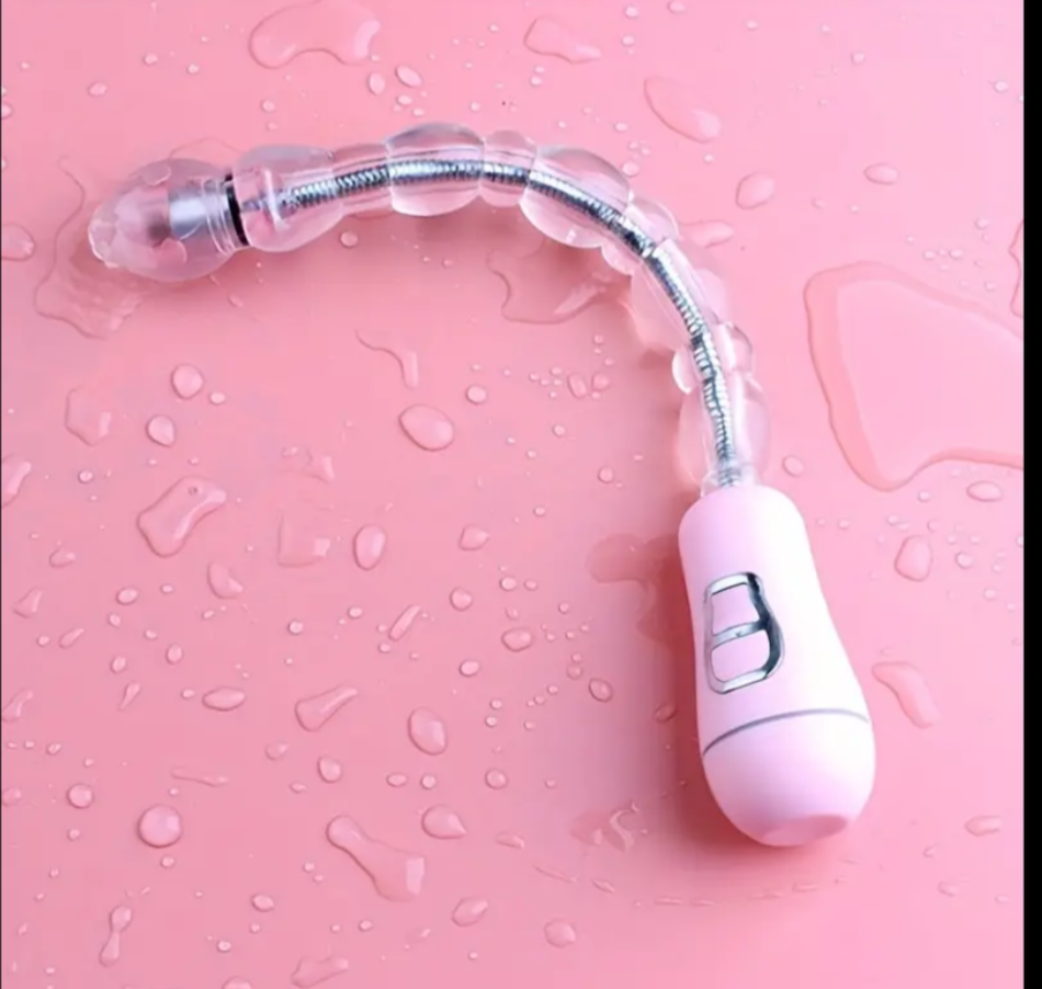 Pink electronic device with flexible arm on a pink textured background