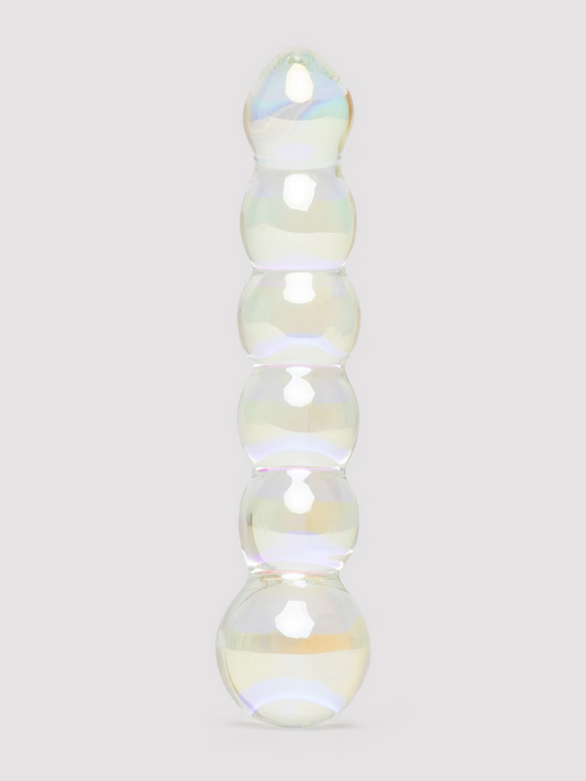 Iridescent glass bead on a light gray background