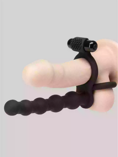 Black finger exerciser on a light gray background