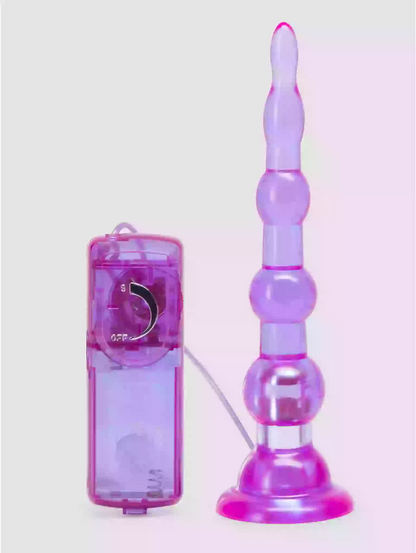 Purple and pink smoking device with packaging on a white background
