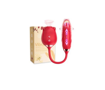 Red vibrator with packaging on a white background