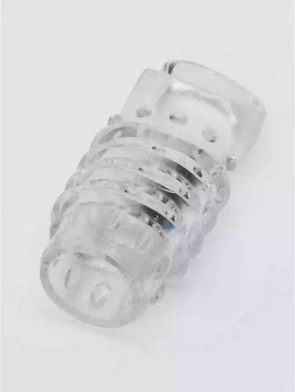 Clear plastic component on a white background