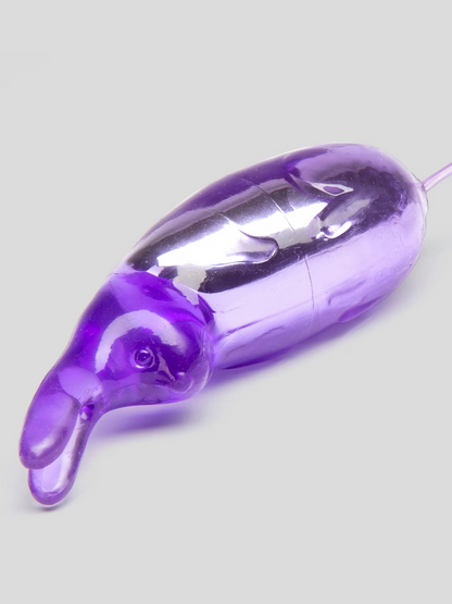 Purple rubber duck on a white background