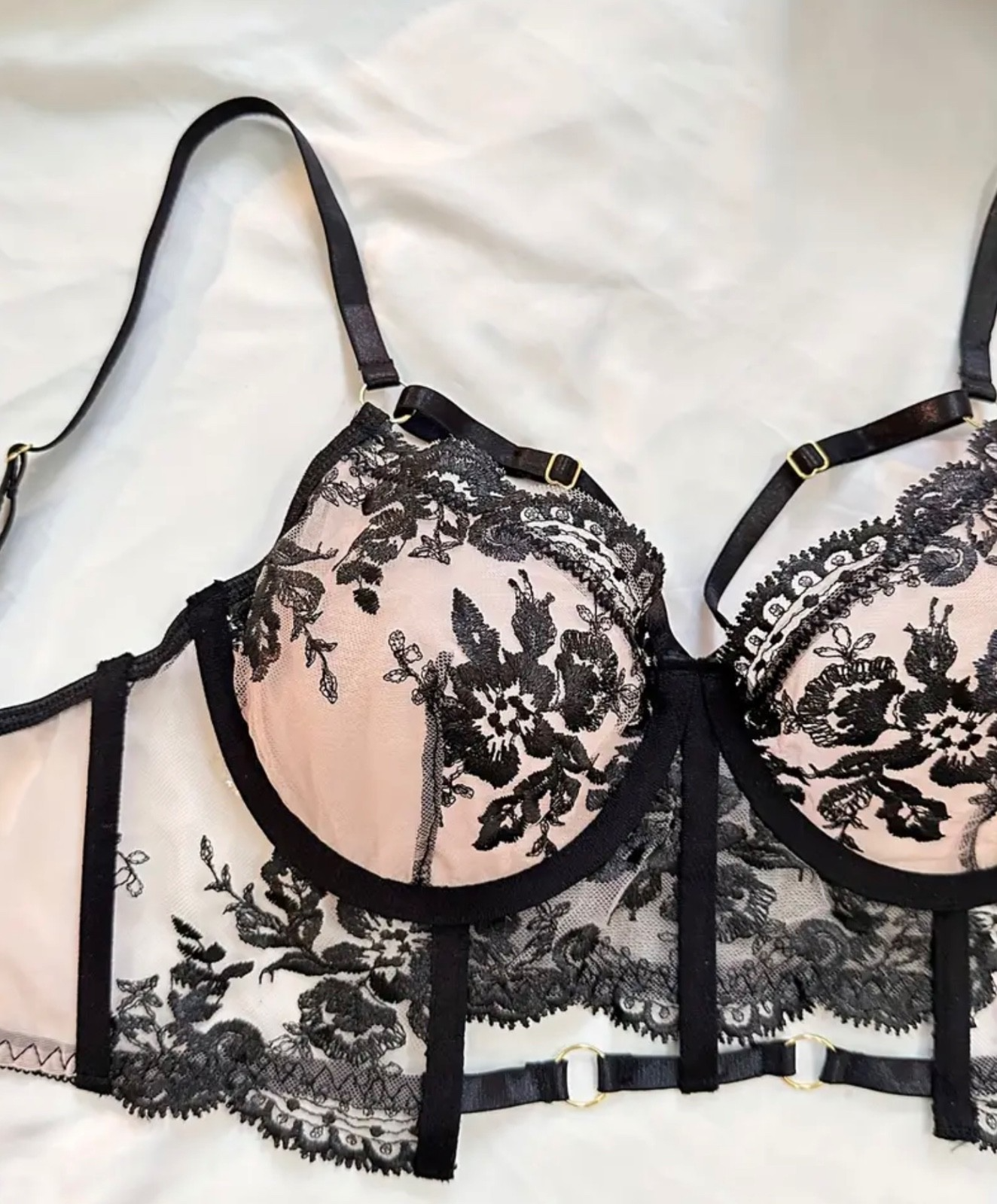 Black lace bra on a white background