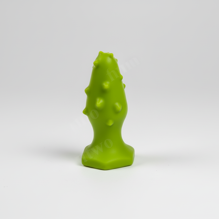 Green textured object on a white background