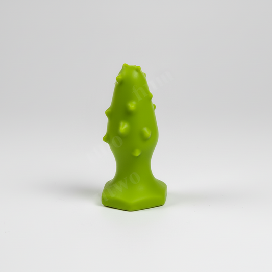 Green textured object on a white background