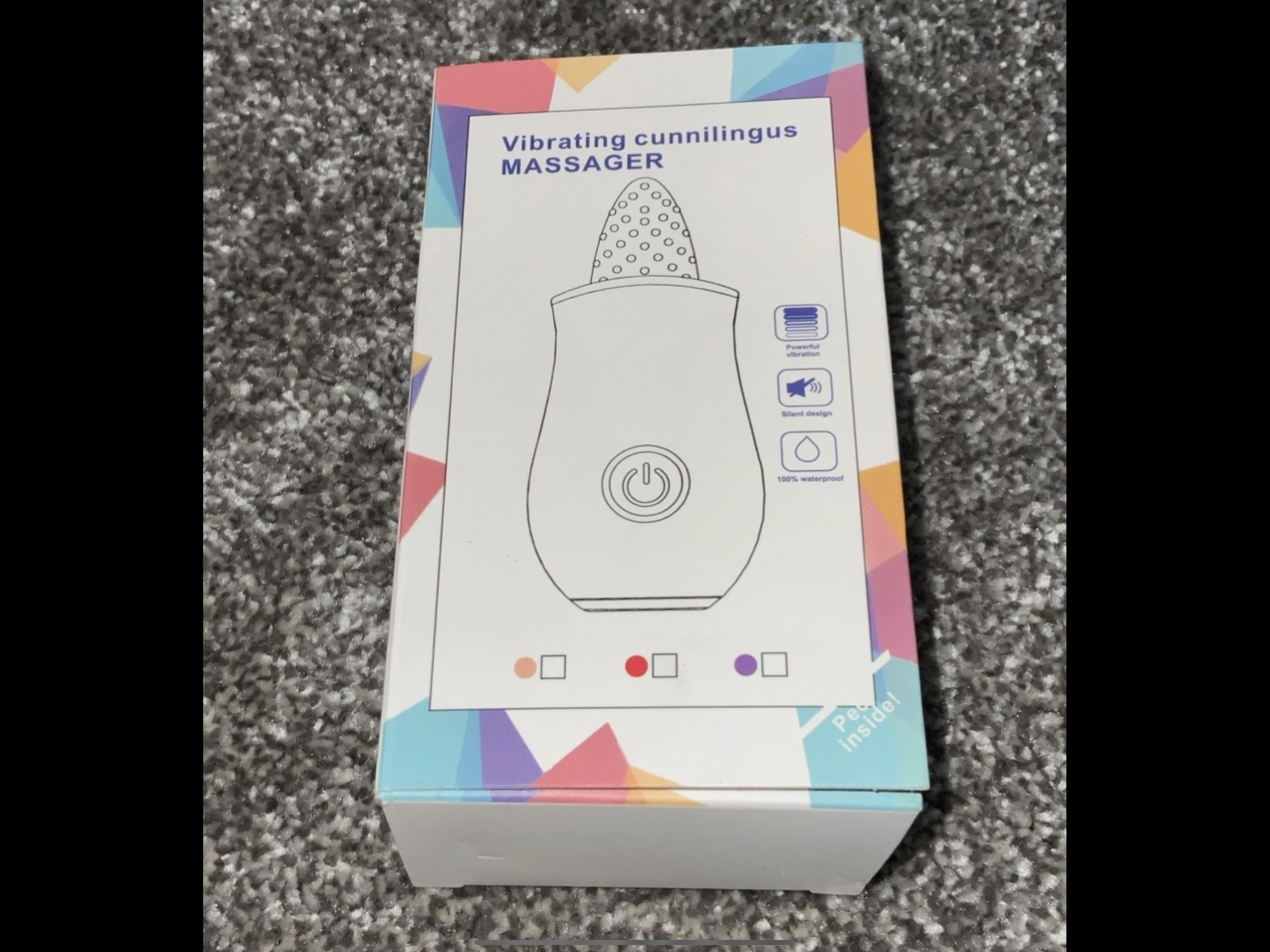 Box of a vibrating product on a textured gray surface