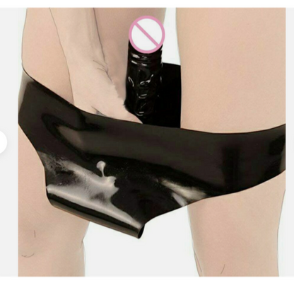 Black latex garment with a pink and white label on a white background