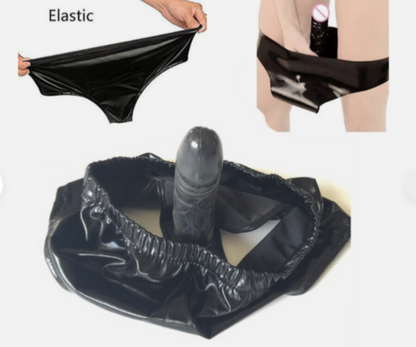 Black elastic material being stretched and shown on a white background