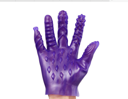 Purple grooming glove with textured surface on a white background