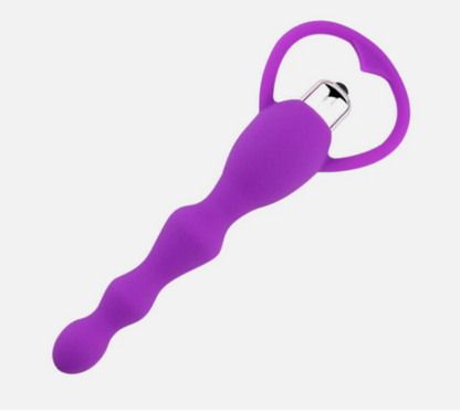 Purple tool with a metallic component on a white background