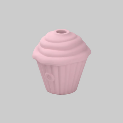 Pink cupcake-shaped object on a gray background