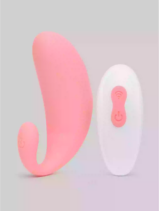 Pink and white electronic device on a light gray background