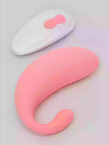 Pink and white curved objects on a light gray background