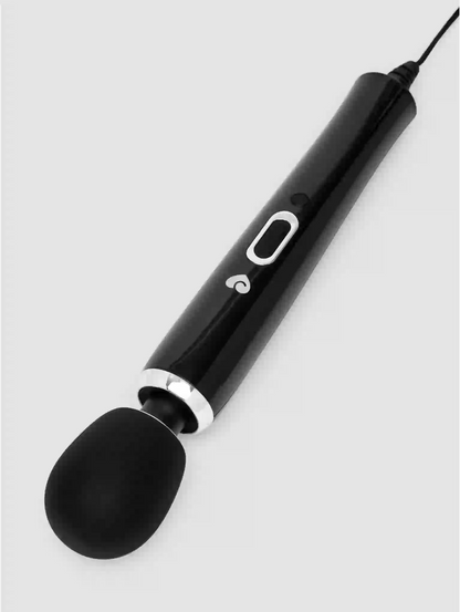 Black handheld electronic device with a spoon-like end on a light gray background
