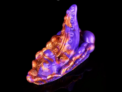 Colorful octopus-like sculpture on a black background