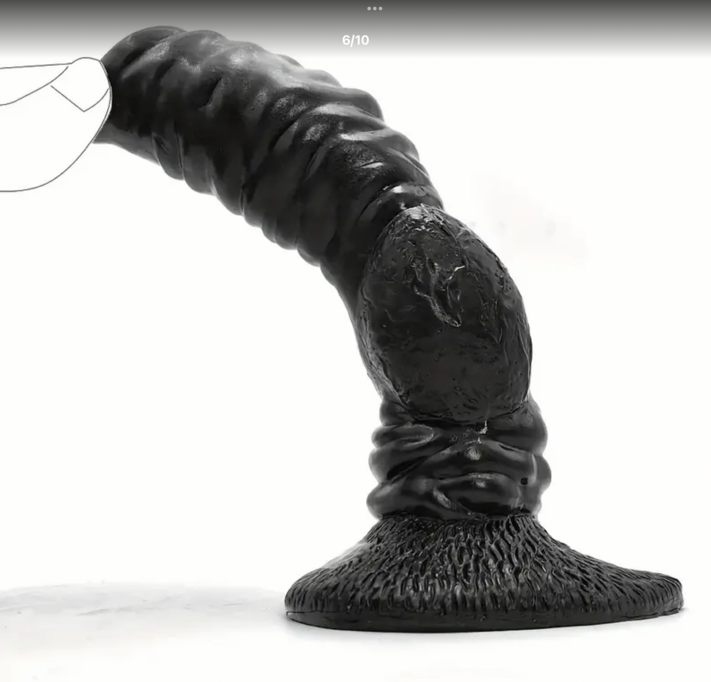 Black rubber-like object on a white background