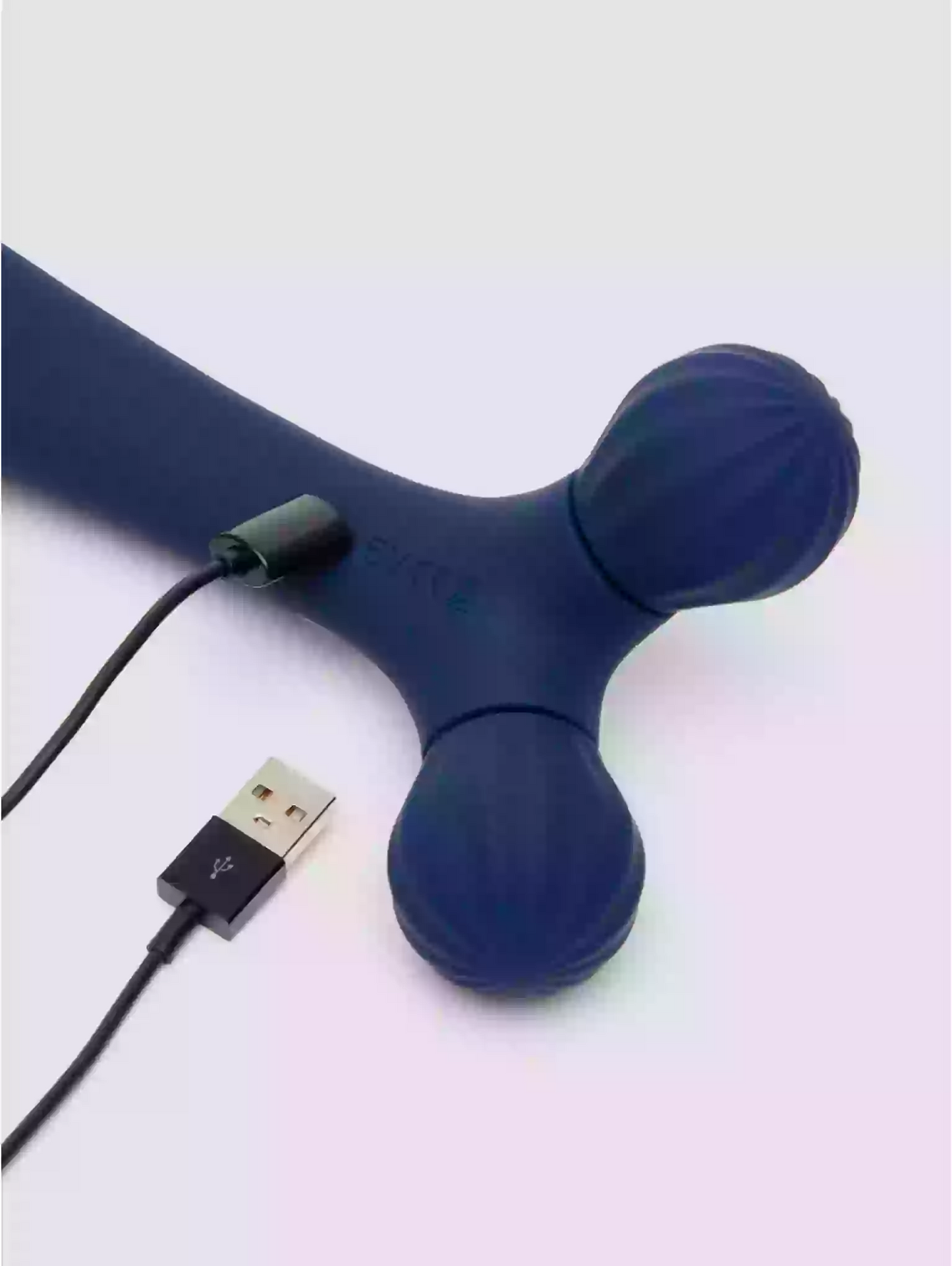 Blue handheld massager with USB cable on a white background