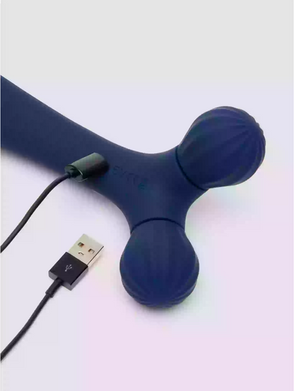 Blue handheld massager with USB cable on a white background
