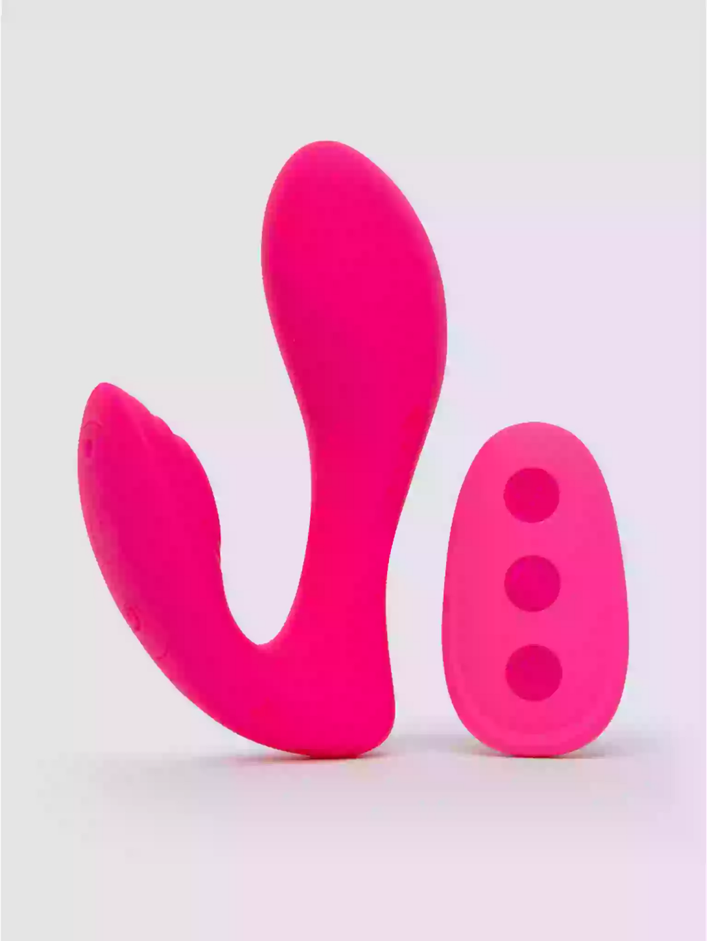 Two pink silicone products on a light gray background